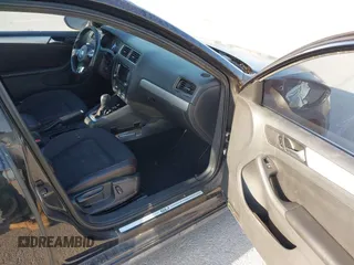 2013 Volkswagen Jetta GLI with VIN 3VW4S7AJ2DM300120, listed as a IAAI auction lot 42002950 with 106,304 mi miles and . Bid and sale history available at DreamBid. Image 5.