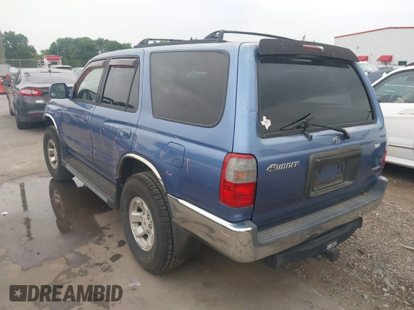 1999 Toyota 4Runner SR5 with VIN JT3GN86R1X0097244, listed as a IAAI auction lot 41948315 with 128,531 mi miles and . Bid and sale history available at DreamBid. Image 3.