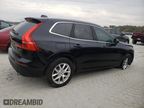 2018 Volvo XC60 Momentum with VIN LYV102RK1JB073418, listed as a Copart auction lot 73763614 with 64,692 mi miles and Salvage Title. Bid and sale history available at DreamBid. Image 3.