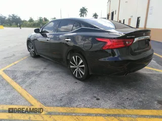 2016 Nissan Maxima SR with VIN 1N4AA6AP9GC428938, listed as a IAAI auction lot 42419663 with 121,501 mi miles and . Bid and sale history available at DreamBid. Image 3.