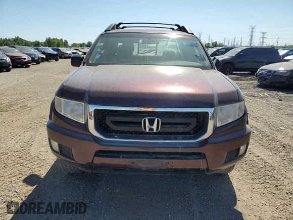2009 Honda Ridgeline RT z VIN 5FPYK16239B106377, wystawiony jako Copart lot #70242764 z przebiegiem 187 760 mil mil oraz Czysty tytuł • Clean title. Historia ofert i sprzedaży dostępna na DreamBid. Obrazek 5.