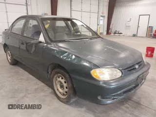 1998 Kia Spectra z VIN KNAFB1212W5743039, wystawiony jako IAAI lot #41597963 z przebiegiem 354 424 mil mil oraz . Historia ofert i sprzedaży dostępna na DreamBid. Obrazek 1.
