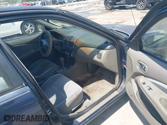 2003 Nissan Sentra XE with VIN 3N1CB51D83L813375, listed as a IAAI auction lot 42090865 with 125,492 mi miles and . Bid and sale history available at DreamBid. Image 5.