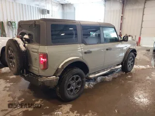 2023 Ford Bronco with VIN 1FMEE5BPXPLB61295, listed as a IAAI auction lot 41623328 with 24,599 mi miles. Bid and sale history available at carsss.com. Image 4.