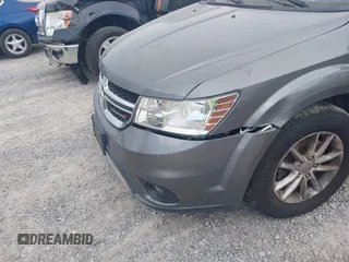 2013 Dodge Journey SXT with VIN 3C4PDCBG7DT568284, listed as a IAAI auction lot 42508928 with 215,803 mi miles and . Bid and sale history available at DreamBid. Image 6.