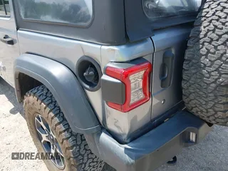 2020 Jeep Wrangler Unlimited Sport with VIN 1C4HJXDN6LW181802, listed as a IAAI auction lot 42402956 with 65,053 mi miles and . Bid and sale history available at DreamBid. Image 18.