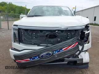 2022 Ford F-150 Lightning Pro with VIN 1FTVW1EL3NWG16132, listed as a IAAI auction lot 42362459 with 16,509 mi miles and . Bid and sale history available at DreamBid. Image 6.