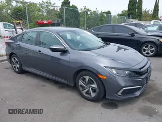 2020 Honda Civic LX z VIN 2HGFC2F60LH596396, wystawiony jako IAAI lot #42354812 z przebiegiem 62 082 mil mil oraz . Historia ofert i sprzedaży dostępna na DreamBid. Obrazek 1.