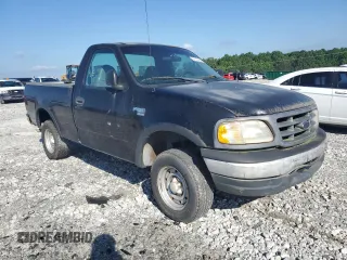 2000 Ford F-150 XL with VIN 1FTRF18W9YNB95521, listed as a Copart auction lot 57720434 with 203,143 mi miles and Clean title. Bid and sale history available at DreamBid. Image 4.