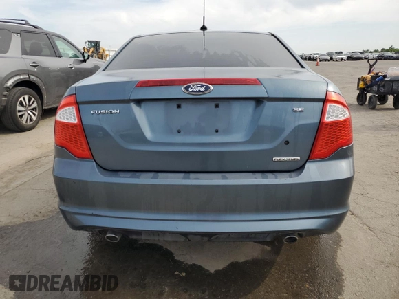 2012 Ford Fusion SE with VIN 3FAHP0HG4CR439700, listed as a Copart auction lot 55185555 with 130,453 mi miles and Clean Title. Bid and sale history available at DreamBid. Image 6.