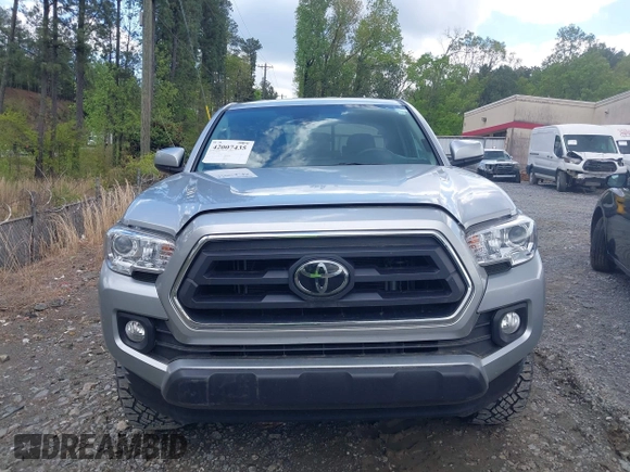 2023 Toyota Tacoma SR with VIN 3TYRX5GNXPT069128, listed as a IAAI auction lot 42007435 with 18,000 mi miles and . Bid and sale history available at DreamBid. Image 12.
