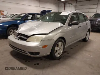 2007 Ford Focus S with VIN 1FAFP37NX7W330802, listed as a IAAI auction lot 41663895 with 147,015 mi miles and . Bid and sale history available at carsss.com. Image 2.