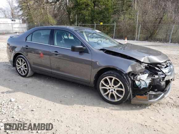 2012 Ford Fusion SE with VIN 3FAHP0HA4CR275893, listed as a Copart auction lot 52882725 with 192,725 mi miles and Salvage Title. Bid and sale history available at DreamBid. Image 4.