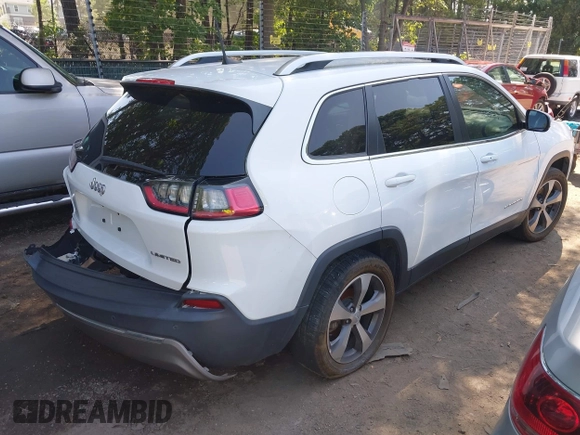 2020 Jeep Cherokee Limited with VIN 1C4PJLDBXLD652811, listed as a IAAI auction lot 42536594 with 93,785 mi miles and . Bid and sale history available at DreamBid. Image 4.