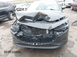 2021 Mazda 3 Premium z VIN JM1BPAML1M1318708, wystawiony jako IAAI lot #42178243 z przebiegiem 62 455 mil mil oraz . Historia ofert i sprzedaży dostępna na DreamBid. Obrazek 12.