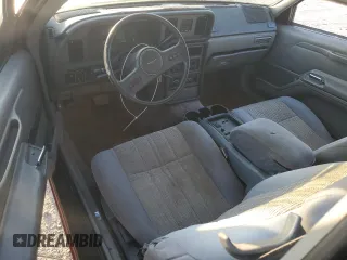 1988 Ford Thunderbird with VIN 1FABP6041JH103866, listed as a Copart auction lot 51694165 with 94,935 mi miles and Salvage Title. Bid and sale history available at carsss.com. Image 8.