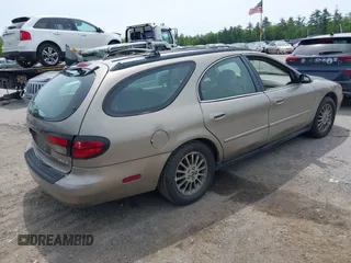 2004 Mercury Sable LS Premium z VIN 1MEHM59S34A626679, wystawiony jako IAAI lot #42364055 z przebiegiem 98 760 mil mil oraz . Historia ofert i sprzedaży dostępna na DreamBid. Obrazek 4.