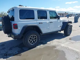 2025 Jeep Wrangler Rubicon with VIN 1C4PJXFN9SW523685, listed as a IAAI auction lot 41945204 with 24 mi miles and . Bid and sale history available at DreamBid. Image 4.