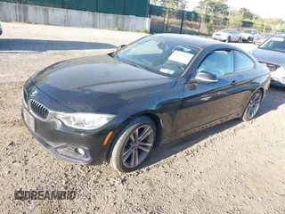 2014 BMW 4 Series 428i xDrive with VIN WBA3N9C55EF721295, listed as a IAAI auction lot 42139256 with 85,472 mi miles and . Bid and sale history available at carsss.com. Image 18.