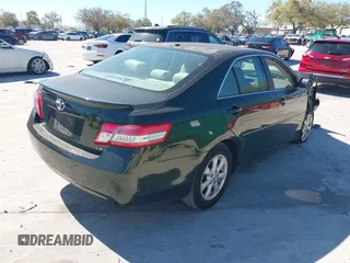 2011 Toyota Camry LE with VIN 4T4BF3EK2BR144228, listed as a IAAI auction lot 41754726 with 124,852 mi miles. Bid and sale history available at carsss.com. Image 4.