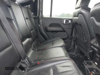 2021 Jeep Gladiator Rubicon with VIN 1C6JJTBG7ML554354, listed as a IAAI auction lot 41796943 with 61,513 mi miles and . Bid and sale history available at DreamBid. Image 8.