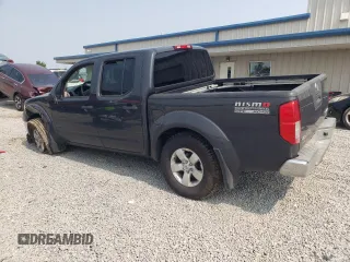 2010 Nissan Frontier LE with VIN 1N6AD0EV3AC407062, listed as a Copart auction lot 60444785 with 96,631 mi miles and Salvage title. Bid and sale history available at DreamBid. Image 2.