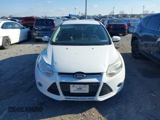 2012 Ford Focus SE z VIN 1FAHP3K29CL265135, wystawiony jako IAAI lot #40989480 z przebiegiem 158 742 mil mil oraz . Historia ofert i sprzedaży dostępna na DreamBid. Obrazek 12.