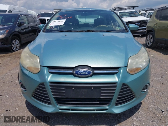 2012 Ford Focus SE with VIN 1FAHP3F2XCL240934, listed as a IAAI auction lot 42673102 with 188,658 mi miles and . Bid and sale history available at DreamBid. Image 6.