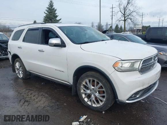 2014 Dodge Durango Citadel with VIN 1C4RDJEG0EC476018, listed as a IAAI auction lot 41212456 with 154,929 mi miles and . Bid and sale history available at DreamBid. Image 1.