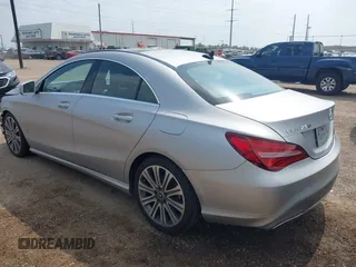 2018 Mercedes-Benz CLA 250 with VIN WDDSJ4EB4JN617063, listed as a IAAI auction lot 42205035 with 88,145 mi miles and . Bid and sale history available at DreamBid. Image 3.