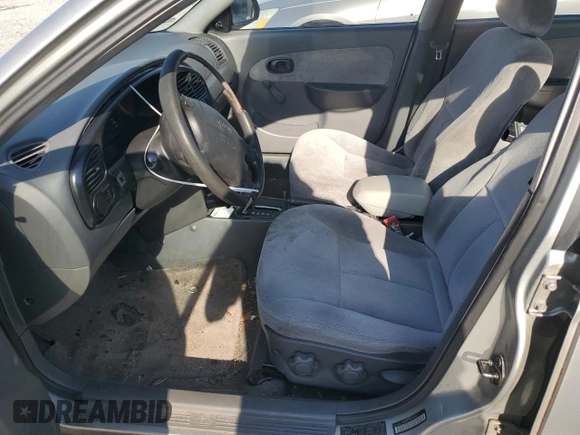 2004 Kia Spectra z VIN KNAFB121145308252, wystawiony jako Copart lot #53377555 z przebiegiem 206 439 mil mil oraz Szkoda całkowita • Salvage title. Historia ofert i sprzedaży dostępna na DreamBid. Obrazek 7.