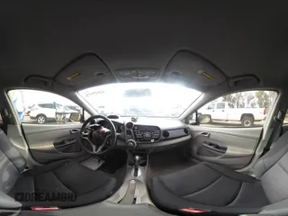 2010 Honda Insight EX with VIN JHMZE2H75AS003695, listed as a IAAI auction lot 42119429 with 90,901 mi miles and . Bid and sale history available at DreamBid. Image 19.