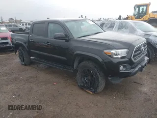 2017 Toyota Tacoma SR5 with VIN 5TFAZ5CN2HX040954, listed as a IAAI auction lot 41733137 with 97,780 mi miles and . Bid and sale history available at DreamBid. Image 1.