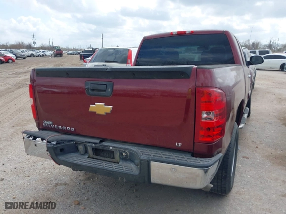 2013 Chevrolet Silverado 1500 LT with VIN 1GCRCSE02DZ385226, listed as a IAAI auction lot 41450120 with 113,163 mi miles. Bid and sale history available at carsss.com. Image 4.