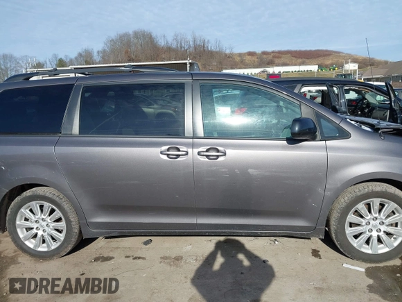 2013 Toyota Sienna LE with VIN 5TDJK3DC8DS056730, listed as a IAAI auction lot 41141247 with 166,579 mi miles and . Bid and sale history available at DreamBid. Image 13.