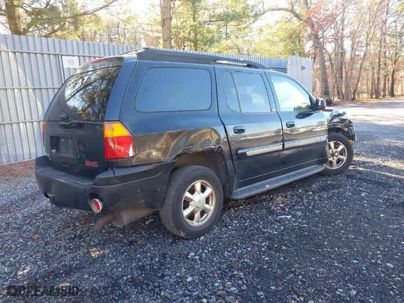 2003 GMC Envoy XL SLT with VIN 1GKET16S636121620, listed as a IAAI auction lot 41197711 with 225,866 mi miles. Bid and sale history available at carsss.com. Image 4.