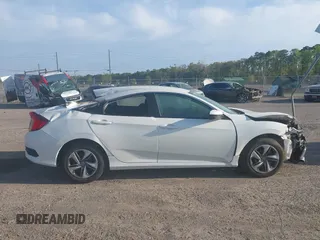 2020 Honda Civic LX with VIN 19XFC2F62LE212421, listed as a IAAI auction lot 41909995 with 46,312 mi miles and . Bid and sale history available at DreamBid. Image 13.