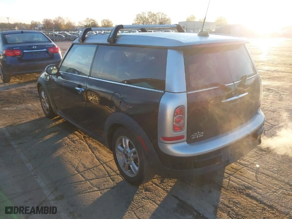 2012 MINI Cooper Clubman with VIN WMWZF3C5XCT189559, listed as a IAAI auction lot 41866550 with 154,721 mi miles. Bid and sale history available at carsss.com. Image 3.