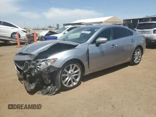 2014 Mazda 6 i Grand Touring с VIN JM1GJ1W65E1130404, выставлен на аукционе Copart как лот 58365635 с пробегом 100 357 миль миль и Списание • Salvage title. История ставок и продаж доступна на DreamBid. Изображение 1.