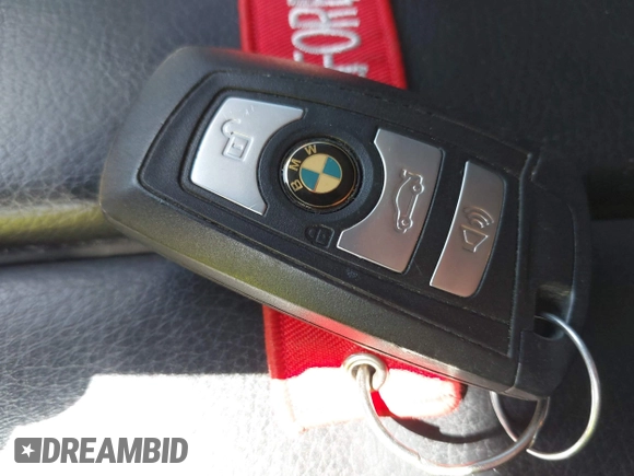 2012 BMW 5 Series 528i xDrive with VIN WBAXH5C54CDW07833, listed as a IAAI auction lot 42058437 with 118,213 mi miles and . Bid and sale history available at carsss.com. Image 11.