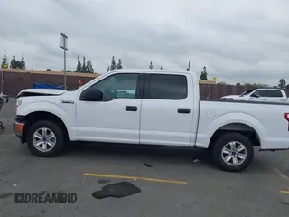 2018 Ford F-150 XL with VIN 1FTEW1CB4JKC87131, listed as a IAAI auction lot 42120579 with 93,143 mi miles. Bid and sale history available at carsss.com. Image 14.