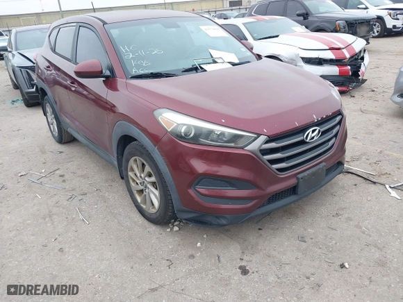 2016 Hyundai Tucson SE with VIN KM8J23A4XGU041915, listed as a IAAI auction lot 41573038 with 101,937 mi miles. Bid and sale history available at carsss.com. Image 1.