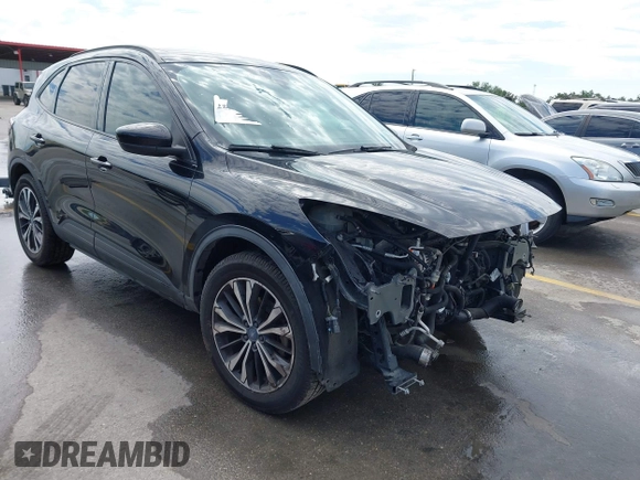 2021 Ford Escape SE with VIN 1FMCU0G62MUA12575, listed as a IAAI auction lot 42293939 with 96,359 mi miles and . Bid and sale history available at DreamBid. Image 1.