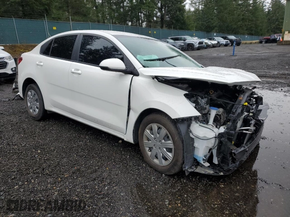 2022 Kia Rio S with VIN 3KPA24AD7NE448158, listed as a Copart auction lot 52122265 with 0 mi miles and Salvage Title. Bid and sale history available at carsss.com. Image 4.