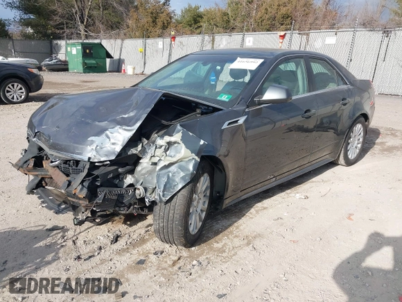 2012 Cadillac CTS Luxury z VIN 1G6DE5E51C0112608, wystawiony jako IAAI lot #41656992 z przebiegiem Nie podano mil oraz . Historia ofert i sprzedaży dostępna na DreamBid. Obrazek 17.