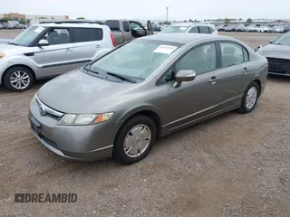 2006 Honda Civic z VIN JHMFA36286S006836, wystawiony jako IAAI lot #42324244 z przebiegiem 217 417 mil mil oraz . Historia ofert i sprzedaży dostępna na DreamBid. Obrazek 2.