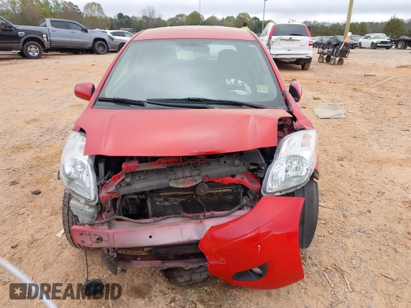 2009 Toyota Yaris with VIN JTDJT903595243068, listed as a IAAI auction lot 41899358 with 310,199 mi miles. Bid and sale history available at carsss.com. Image 12.