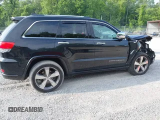 2016 Jeep Grand Cherokee Overland with VIN 1C4RJFCG3GC417699, listed as a IAAI auction lot 42419054 with 109,911 mi miles and . Bid and sale history available at DreamBid. Image 13.
