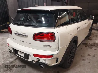 2023 MINI Clubman Cooper S with VIN WMWXJ1C02P2S77645, listed as a IAAI auction lot 41300674 with 34,302 mi miles. Bid and sale history available at carsss.com. Image 4.