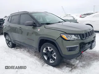 2018 Jeep Compass Trailhawk with VIN 3C4NJDDB5JT190890, listed as a IAAI auction lot 41251405 with 35,320 mi miles and . Bid and sale history available at carsss.com. Image 1.
